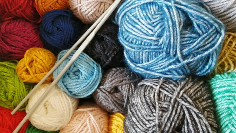 Balls of wool yarn in several colours