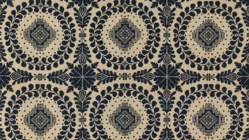 Black and cream ornate patterned textile