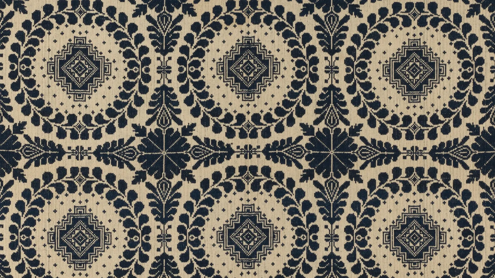 Black and cream ornate patterned textile