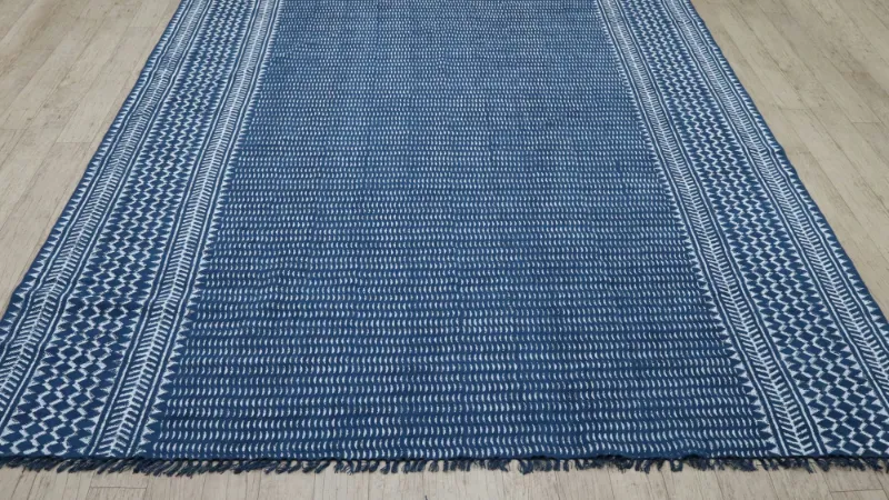 Blue flat-woven rug