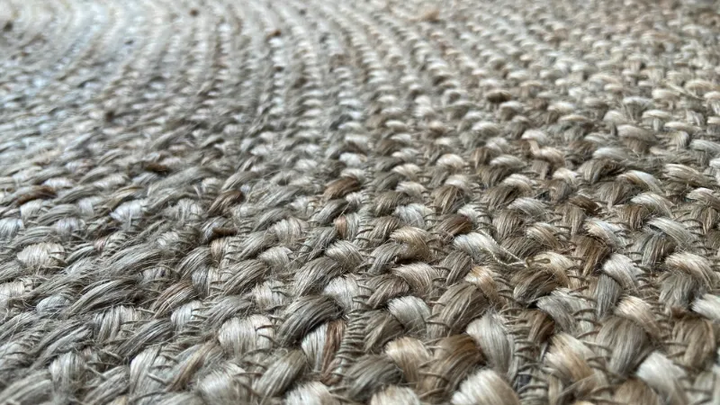 Close-up of a woven natural-fibre rug