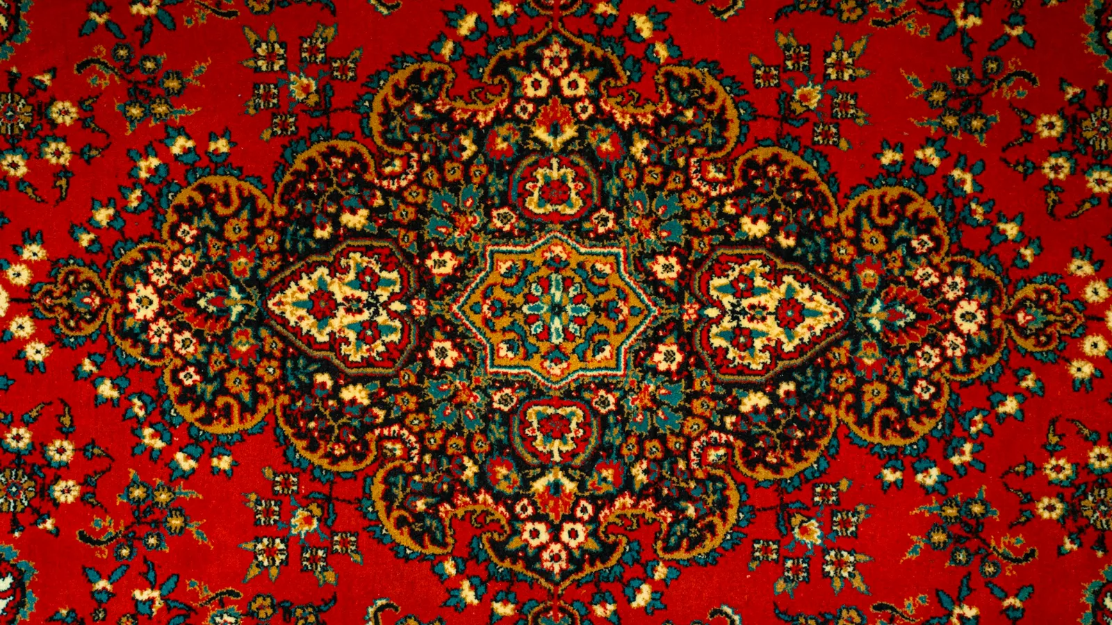 Detailed red and navy oriental rug pattern
