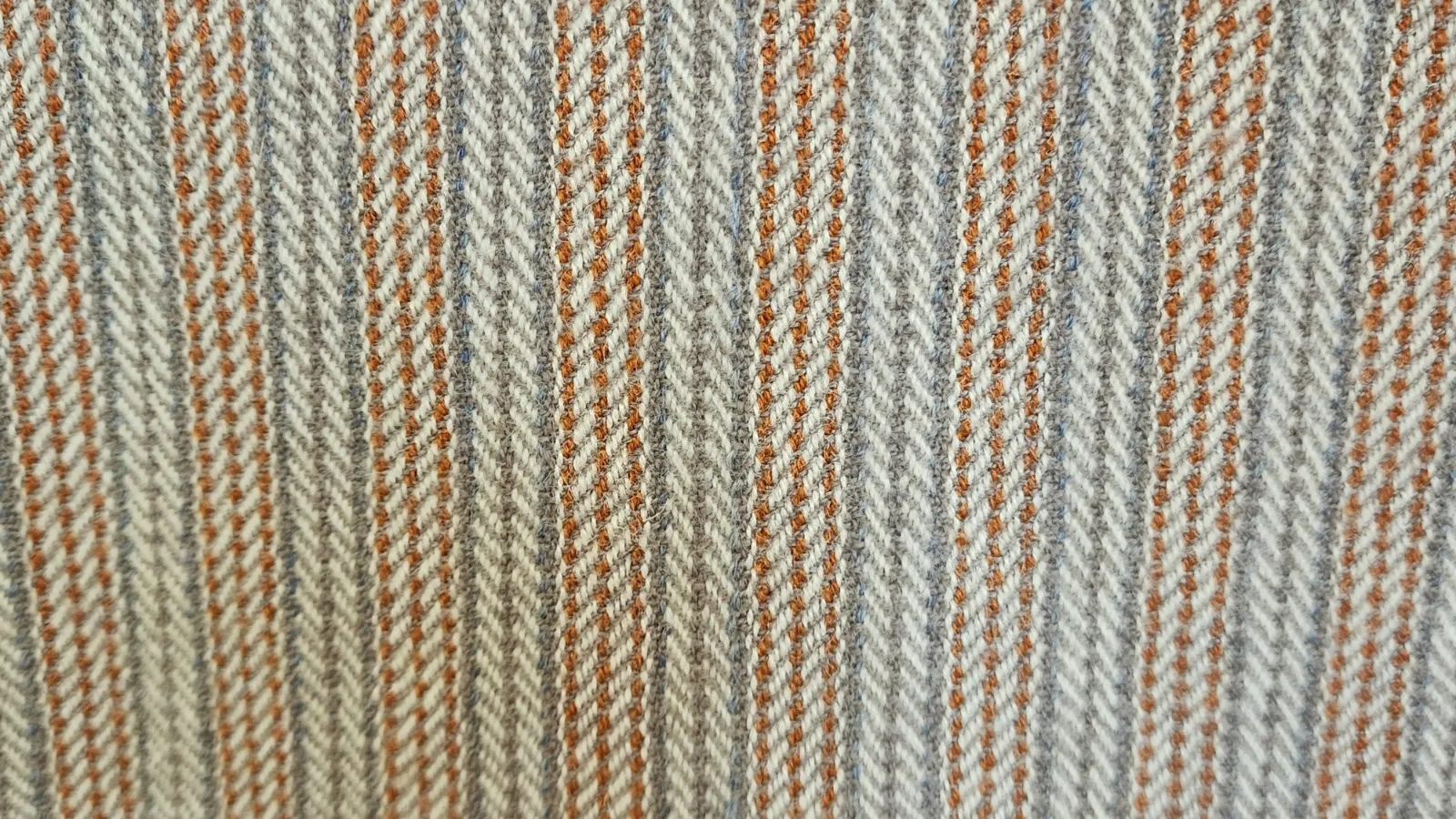 Fine striped woven textile