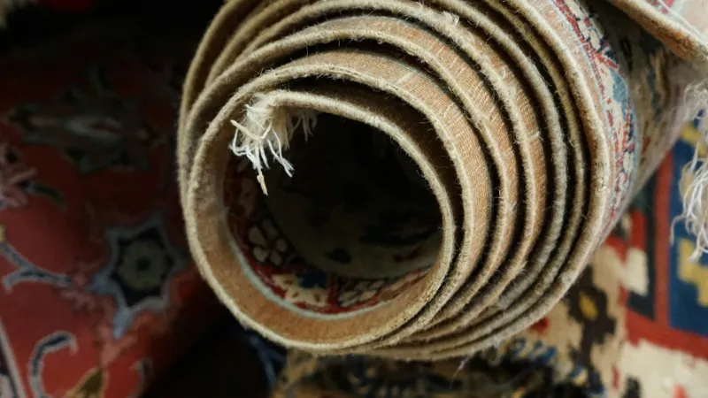 Rolled rug seen end-on