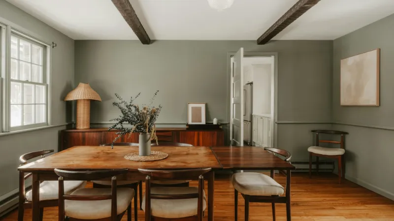 Scandinavian dining space with timber furniture